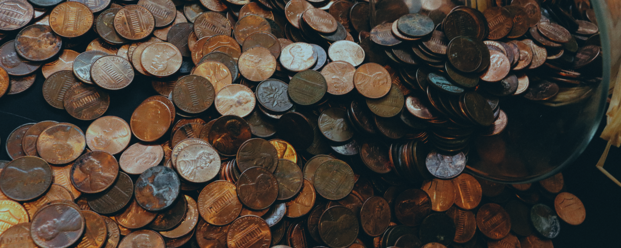 Coins spread across a surface