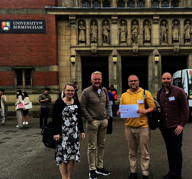A photo of Marianne, Jonas, Anders and Lari in front of Birmingham university.