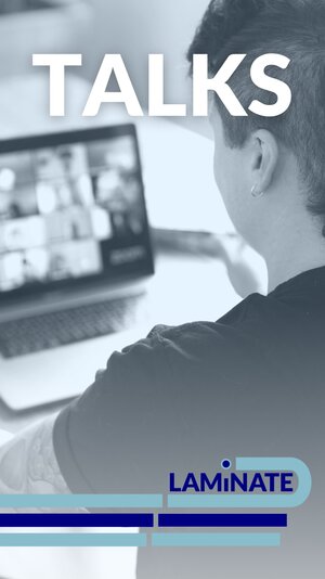 The photo is taken over the shoulder of a person in a zoom meeting.