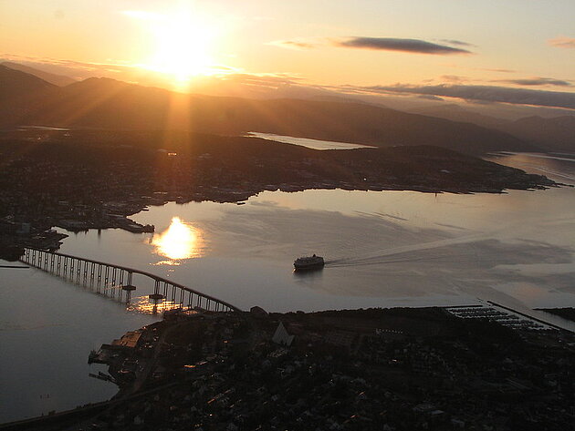 An aerial view of Tromsö under the midnight sun.