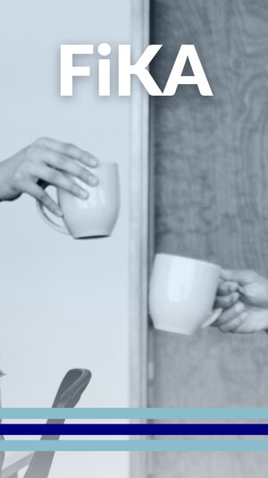Two hands hold coffee mugs